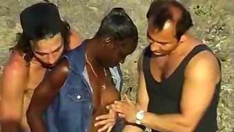 Three White Men Pleasure A Black Woman On The Coast