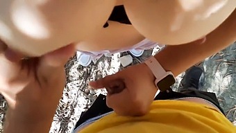 Busty Exhibitionist Gives A Blowjob In The Great Outdoors